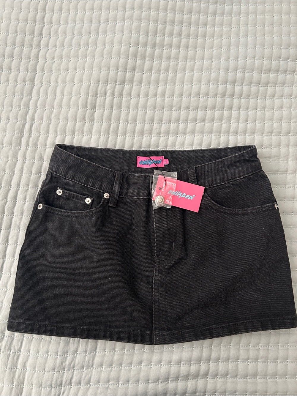 Edikted Black Denim Mini Skirt with Pink Logo Tag